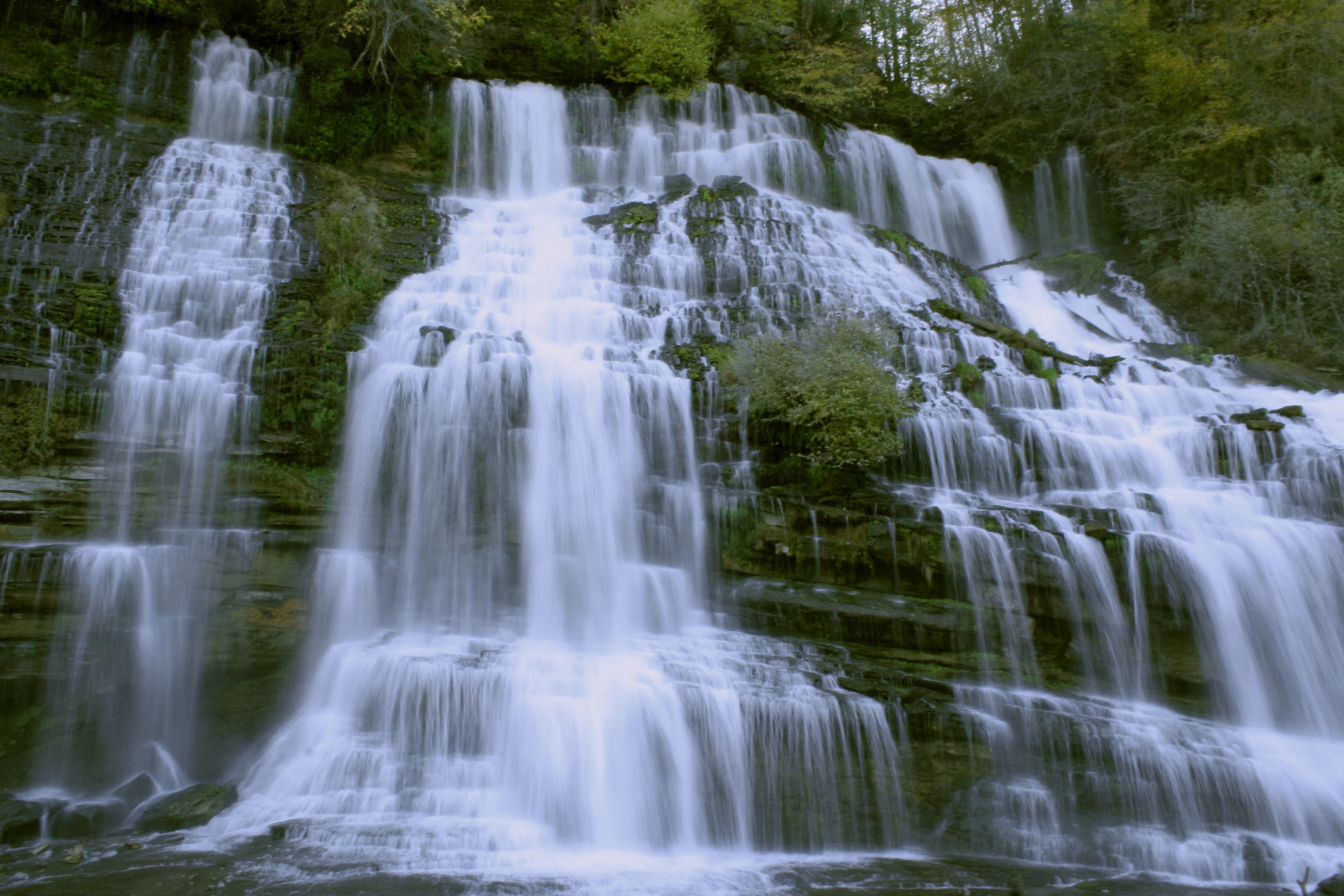 Rock Island's Waterfall Comes Out of the Side of a Cliff